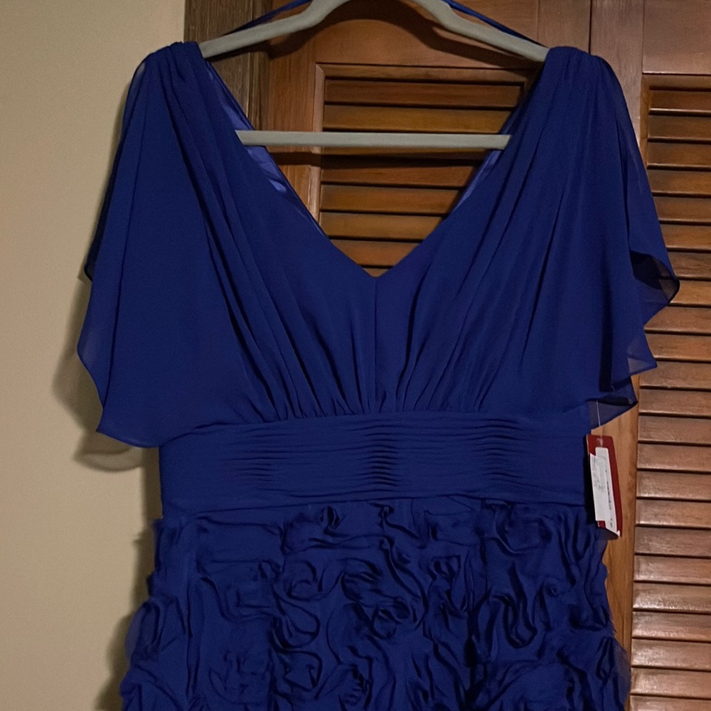 Deep Iris blue cocktail dress never worn. Beautiful textured skirt